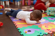 © Krakenimages.com - Adorable toddler lying on floor crying at kindergarten