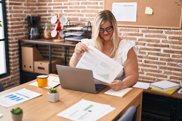Poster - Young woman business worker using laptop reading document at office