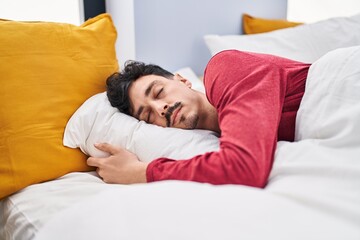 Sticker - Young caucasian man lying on bed sleeping at bedroom