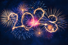 2023 Happy New Year Concept With Sparkles In The Night Sky. Sparkle Firework On Black Background For Banner