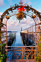 Wall Mural - Christmas market in Konstanz next to the lake with food, gifts, mulled wine and many lights.