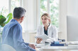 © Westend61 - Female doctor giving advice and discussing with patient over tablet PC at medical practice