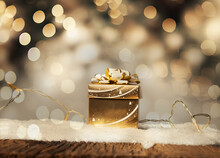 Golden Gift Box And Holiday Lights