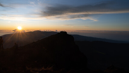 Sunrise view above the old volcano crater mountain of the Piton des Neiges, Reunion island