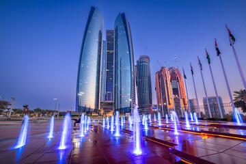 Wall Mural - Cityscape with skyscrapers of Abu Dhabi at night, capital of United Arab Emirates