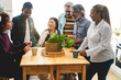© DisobeyArt - Multiracial happy friends having fun drinking inside home kitchen - Focus on asian girl face
