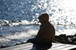 © Frank Middendorf - A man sits on a bench at the coast of Torrevieja-Spain and looks to the open sea.