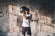© BullRun - Strong male athlete exercising with medicine ball at gym