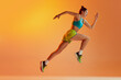 © Lustre Art Group  - Athlete in motion. Young fitness sportive girl in sports uniform running, training isolated over yellow background in neon light. Dynamic movements, running technique.