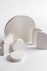 White props for product photography on white seamless background - half-circles, oval doors, rippled arch, zig-zag stairs