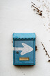 © ADDICTIVE STOCK - Metal mailbox with arrow on white wall