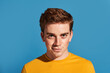 © ADDICTIVE STOCK - Smug young man looking at camera