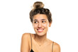 © vladimirfloyd - smiling woman with messy loose bun and no makeup on a white studio background. front view