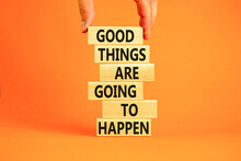 Good Things Happen Symbol. Concept Words Good Things Are Going To Happen On Wooden Blocks On A Beautiful Orange Table Orange Background. Businessman Hand. Business Good Things Happen Concept.