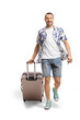 Full length portrait of a smiling man walking and pulling a suitcase