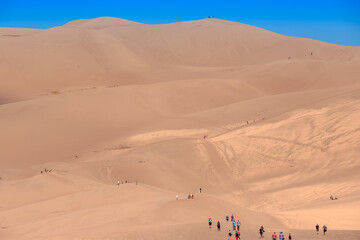 Hikers Climbing the Dunes, Great Sand Dunes National Park, Colorado