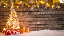 Christmas Still Life With Old Wooden Background And Snowflakes Falling