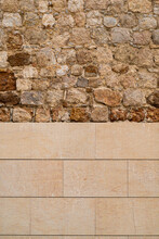 Stone Wall Background, Divided Into Ancient And Irregular Stone And Modern And Geometric Stone. Symmetry