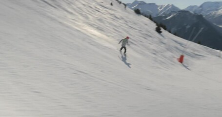 Wall Mural - Snowboarder follow shot