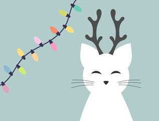Wall Mural - christmas cute funny cat reindeer and christmas lights on blue background.