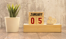5 January Inscription On Wooden Calendar. Wooden Office Desk.