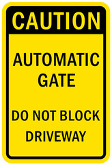 Automatic gate warning sign and label do not block driveway