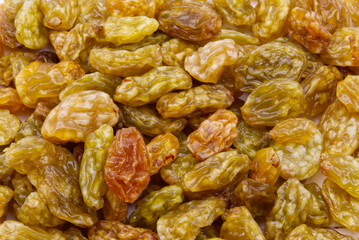 Wall Mural - Texture of dried raisins. Dry raisins as background. Diet food concept