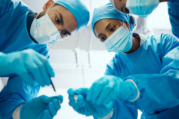 Poster - Surgery, teamwork or doctors in a medical emergency operation theater with collaboration or team work helping a patient. Support, life insurance or focused healthcare workers in face masks working