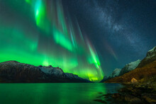Colourful northern lights and Milky Way near Tromso, northern Norway