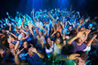 © Arcurs Co-op/peopleimages.com - Dance, music and party with audience at concert for rock, festival or disco with live band performance. Celebration, social and nightclub show with crowd of fans listening for rave or new year event
