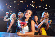 © Grady R/peopleimages.com - Party, nightclub and portrait of women with cocktail for cheers, toast and celebration on ladies night. Alcohol, social event and happy female friends enjoy happy hour at rave, disco and cocktail bar