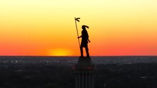 Native American Silhouette At Sunset. Indian Reservation And American History Theme In USA.