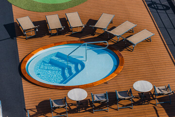 Wall Mural - small swimming pool on the deck of a luxury cruise ship