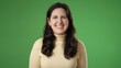 © Robert Peak - Portrait of smiling beautiful brunette blue eyes young woman 20s 30s years old posing isolated on green screen background studio. People sincere emotions lifestyle concept.