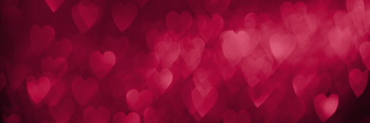 Wall Mural - Trendy viva magenta, pink red hearts, sparkling glitter bokeh panoramic background banner, valentines day abstract defocused texture header. Color of the year 2023