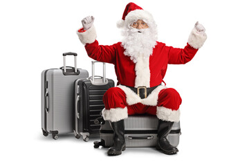 Sticker - Happy santa claus sitting on a suitcase