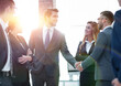 © ASDF - business handshake of businessmen in the office