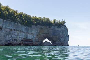 Wall Mural - Boat anchored out on Lake Superior at Pictured Rocks National Lakeshore, Upper Peninsula, Michigan, USA