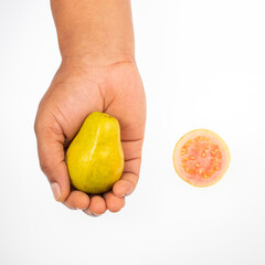 Wall Mural - Psidium guajava - Tropical and exotic guava in farmer hands