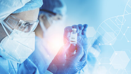 Wall Mural - research scientist holding vaccine bottle in hand on modern clinical laboratory background