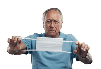 Wall Mural - PNG Shot of an elderly man holding a protective face mask in a studio.