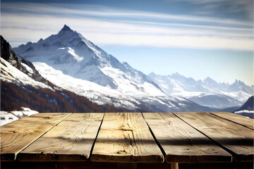 Wall Mural - mountains background with empty wooden table for product display, snowy montains landscape blurred background, copy space