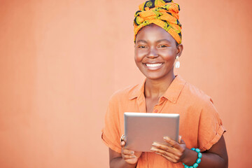 Wall Mural - Black woman, tablet and marketing, advertising portrait with technology mockup against orange studio background. Internet, online connection and wifi, 5g network in Nigeria and digital product promo.