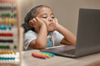 © Beaunitta V W/peopleimages.com - Sad, education and child with laptop for school, studying online and listening on a video call class from home. Tired, adhd and bored girl with a computer for learning problem and e learning