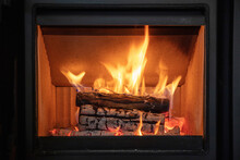 Fire Flames And Burning Wood Logs, Energy Stove Fireplace Close Up,