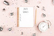 © Yulia Lisitsa - 2023 year goals. A notepad with New Year resolutions and holiday decor. Plan, journal, to-do list. Thougths, dreams and wishes.