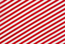 Red And White Diagonal Stripes Material Holiday Background
