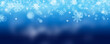 Abstract blue winter background with snow and snowflakes for christmas season.