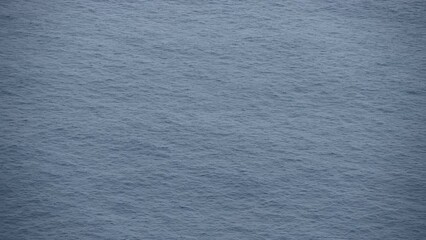 Canvas Print - Aerial view of sea surface. Calm surface of Atlantic ocean