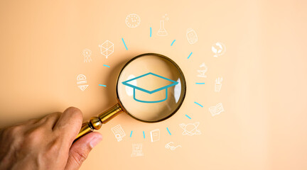 Fototapete - Magnifier focus to graduate cap icon with learning educate, study knowledge to creative thinking idea and problem solving solution, E-learning online education course degree certificate.